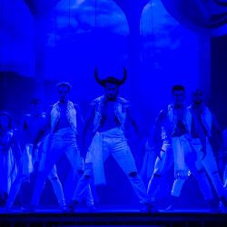 Christopher Politis (centre) and members of the company