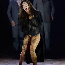 Lorina Gore as Ophelia with Russell Harcourt as Rosencrantz and Christopher Lowrey as Guildenstern in Hamlet.